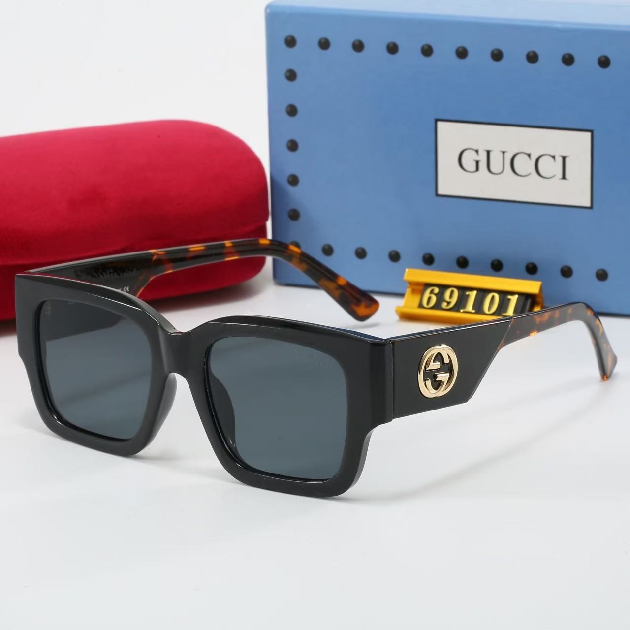 G*u*i sunglasses
